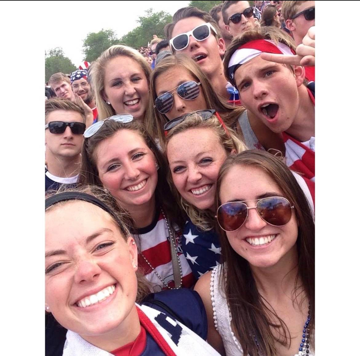 2014 USMNT watch-party crowd selfie in USA gear
